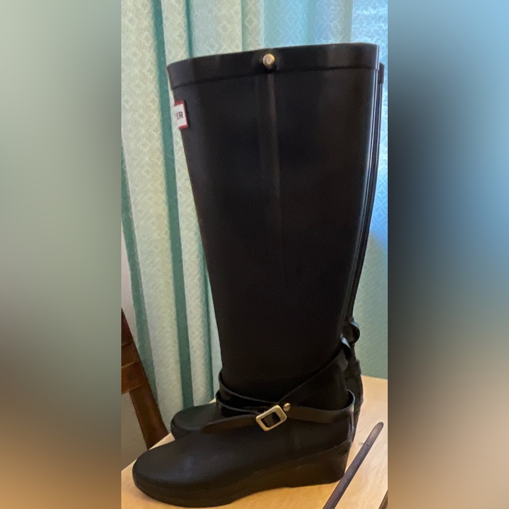 Tall black wedge Hunter rain boots. Size 5
